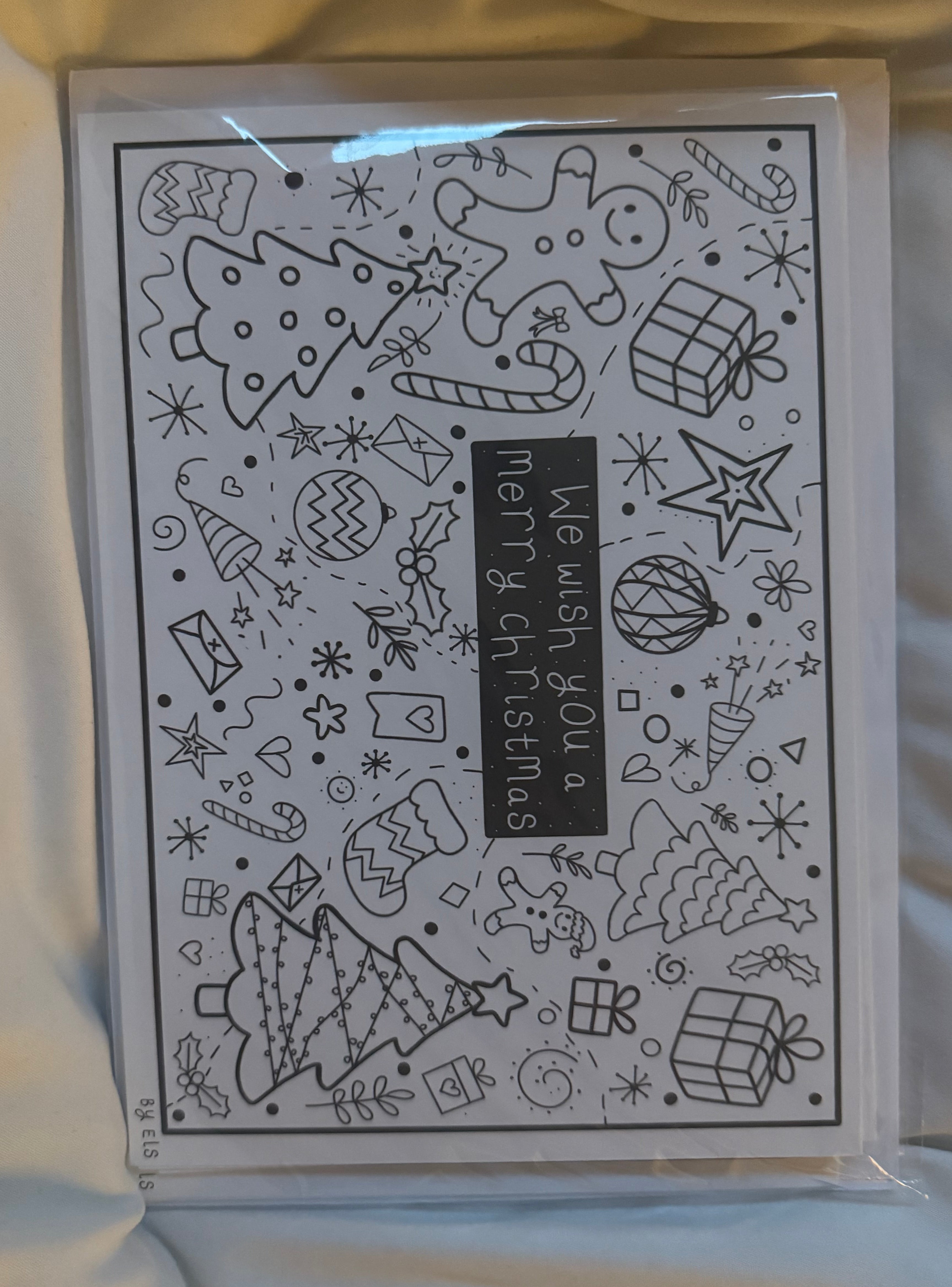 Christmas-themed card with decorative elements and 'Merry Christmas' text on a white background.